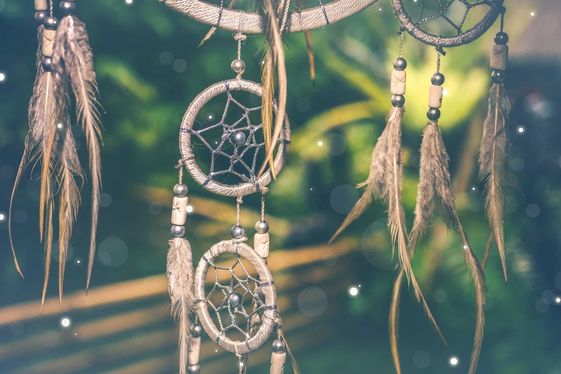 selective focus photo of brown dreamcatcher